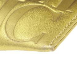 Pre Owned Carolina Herrera Gold Monogram Leather Tassel Clutch