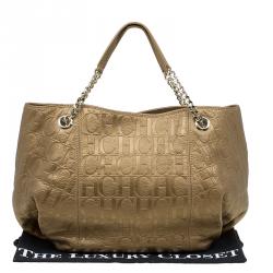Pre Owned Carolina Herrera Gold Monogram Embossed Leather Dahlia Hobo