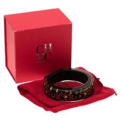 Pre Owned CH Carolina Herrera Black and Gold Tone Resin Bangle