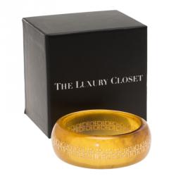 Pre Owned CH Carolina Herrera Yellow Resin Gold Tone Metal Bangle 21cm
