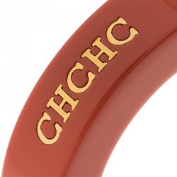 Pre Owned CH Carolina Herrera Orange Resin Gold Tone Wide Bangle 21cm