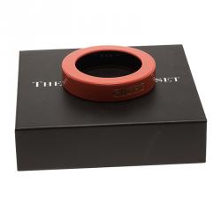 Pre Owned CH Carolina Herrera Orange Resin Gold Tone Wide Bangle 21cm