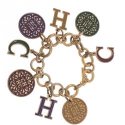 Pre Owned Carolina Herrera CH Multi Color Charm Gold Tone Bracelet