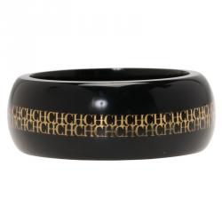 Pre Owned CH Carolina Herrera Black Resin Gold Tone Metal Wide Bangle 20cm