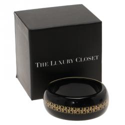 Pre Owned CH Carolina Herrera Black Resin Gold Tone Metal Wide Bangle 20cm