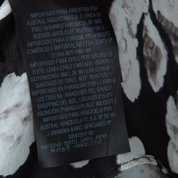 مملوكة مسبقًا توب سي أتش كارولينا هيريرا حرير أسود مورد بعقدة مزينة بلا أكمام مقاس M