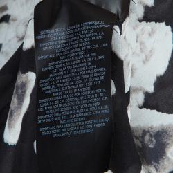 مملوكة مسبقًا توب سي أتش كارولينا هيريرا حرير أسود مورد بعقدة مزينة بلا أكمام مقاس M