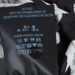 مملوكة مسبقًا توب سي أتش كارولينا هيريرا حرير أسود مورد بعقدة مزينة بلا أكمام مقاس M