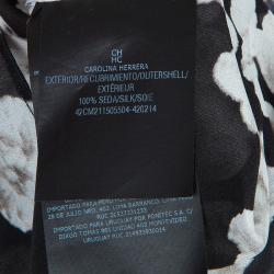 مملوكة مسبقًا توب سي أتش كارولينا هيريرا حرير أسود مورد بعقدة مزينة بلا أكمام مقاس M