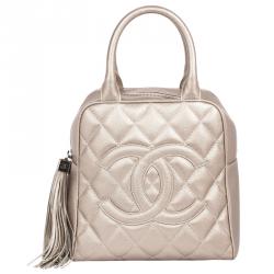 Pre Owned Chanel Metallic Quilted Caviar Tassel Top Handle Bag