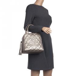 Pre Owned Chanel Metallic Quilted Caviar Tassel Top Handle Bag