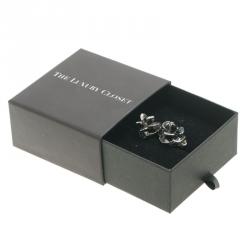 مملوكة مسبقًا Chanel CC Black Enamel Silver Tone Edged Camellia Clip-on Stud Earrings