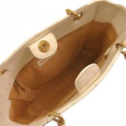 Pre Owned Chanel Beige Quilted Caviar Leather Petite Shopping Tote