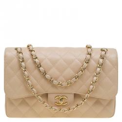 CHANEL, Boston bag in quilted beige caviar leather, the …