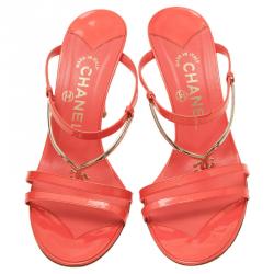 Pre Owned صندل سلايد شانيل جلد برتقالي و شعار ذهبي بسيور مقاس 38