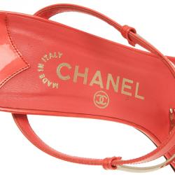 Pre Owned صندل سلايد شانيل جلد برتقالي و شعار ذهبي بسيور مقاس 38