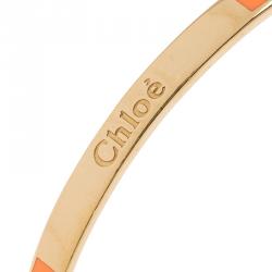 Pre Owned Chloe Holly Cream Enamel Gold Tone Narrow Bangle Bracelet