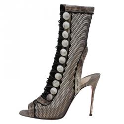 مملوكة مسبقًا بوت كريستيان لوبوتان آتينشن 100 جلد ثعبان البحر بيج بشبكة سوداء مقاس 38.5