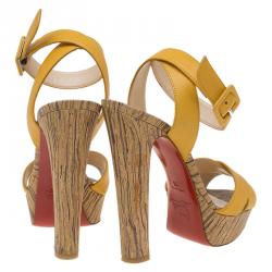 مملوكة مسبقًا Christian Louboutin Yellow Leather Criss Cross Ankle Strap Platform Sandals Size 36