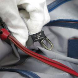 Pre Owned Cole Haan Red/Blue Pebbled Leather Tassel Shopper Tote