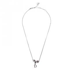 مملوكة مسبقًا قلادة ديور بفيونكة فضي كريستان مونوغرام