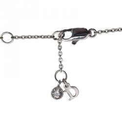 مملوكة مسبقًا قلادة ديور بفيونكة فضي كريستان مونوغرام