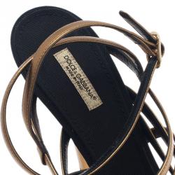 Pre Owned صندل دولتشي أند غابانا ذهبي بسيور و نعل سميك مقاس 40.5