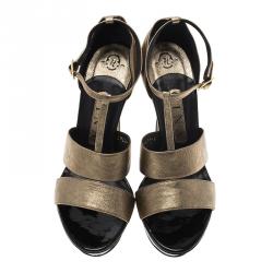 مملوكة مسبقًا صندل جينا جلد ذهبي ميتاليك سير حرف T نعل سميك مقاس 38