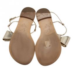 Pre Owned Giuseppe Zanotti Metallic Gold Leather Bow Thong Sandals Size 39