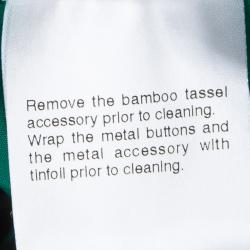 مملوكة مسبقًا فستان غوتشي حرير أسود وأخضر بظهر مكشوف وأكمام طويلة S