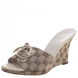مملوكة مسبقًا Gucci Beige GG Canvas Open Toe Wedge Heel Slides Size 39