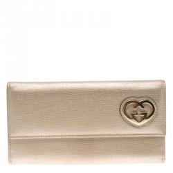 Pre Owned Gucci Metallic Beige Leather Lovely Heart Continental Wallet