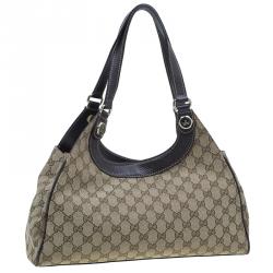 مملوكة مسبقًا حقيبة كتف غوتشي كرمي كانفاس مونوجرامي بني