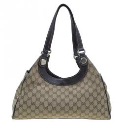 مملوكة مسبقًا حقيبة كتف غوتشي كرمي كانفاس مونوجرامي بني