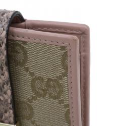 مملوكة مسبقًا محفظة غوتشي جلد ثعبان و كانفاس غوتشيسما بقلاب مضغوطة