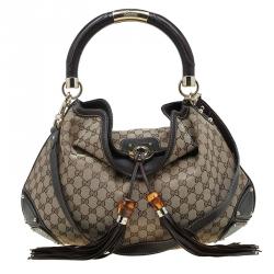 Pre Owned Gucci Beige Monogram Canvas Large Indy Top Handle Bag