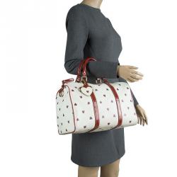 مملوكة مسبقًا حقيبة غوتشي بوسطن فالانتاينز داي جوي سوبريم GG بيضاء