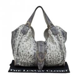 Pre Owned Gucci Beige Lizard Skin Stirrup Hobo