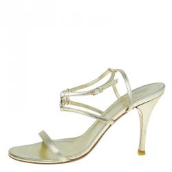 Pre Owned صندل غوتشي جلد ذهبي ميتاليك بالشعار GG وسيور مقاس 38