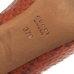 Pre Owned حذاء غوتشي جلد ثعبان برتقالي بفيونكة وأبزيم مقدمة مفتوحة مقاس 37