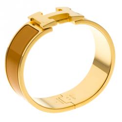 Pre Owned Hermes Clic Clac H Orange Enamel Gold Plated Wide Bracelet PM
