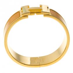 Pre Owned Hermes Clic Clac H Orange Enamel Gold Plated Wide Bracelet PM