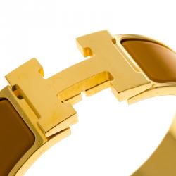 Pre Owned Hermes Clic Clac H Orange Enamel Gold Plated Wide Bracelet PM