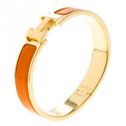 Pre Owned Hermes Clic Clac H Orange Enamel Gold-Plated Narrow Bracelet PM