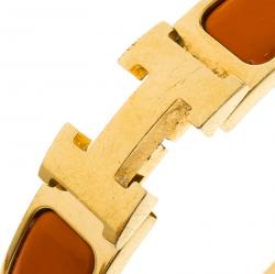 Pre Owned Hermes Clic Clac H Orange Enamel Gold-Plated Narrow Bracelet PM