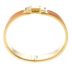 Pre Owned Hermes Clic Clac H Orange Enamel Gold-Plated Narrow Bracelet PM