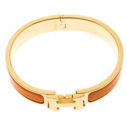 Pre Owned Hermes Clic Clac H Orange Enamel Gold-Plated Narrow Bracelet PM
