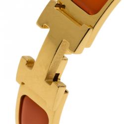 Pre Owned Hermes Clic Clac H Orange Enamel Gold Plated Bracelet
