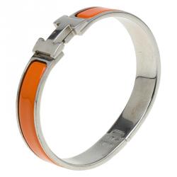 Pre Owned Hermes Clic Clac H Orange Enamel Palladium Plated Bracelet PM