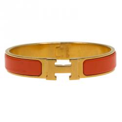 Pre Owned Hermes Clic Clac H Orange Enamel Gold Plated Narrow Bracelet GM